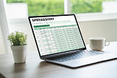 businessman working with data and graphs in spreadsheet documents for online analysis Microsoft Excel project dashboard accounting digital
