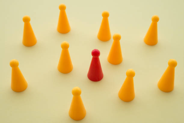 istock Leadership different from the crowd on wood table with white wall background and copy space. 1617928855