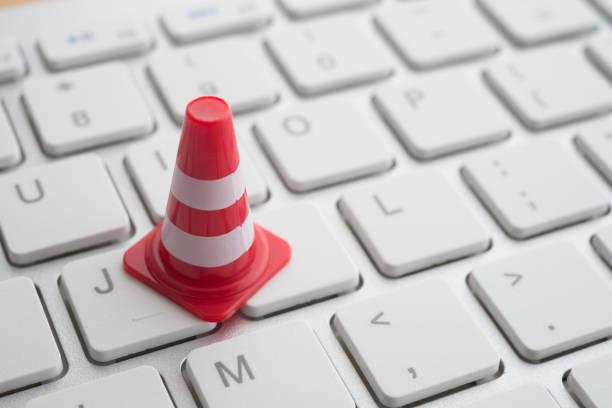 istock Maintenance, repair, under construction in computer system from virus or ransomware concept. 1617930965
