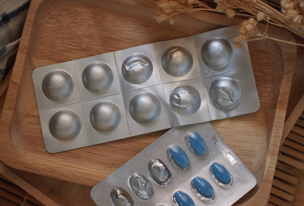 Medicine in metallic blister pack stock photo