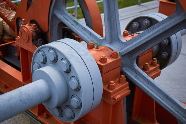 Close-up of a large orange mechanical part stock photo