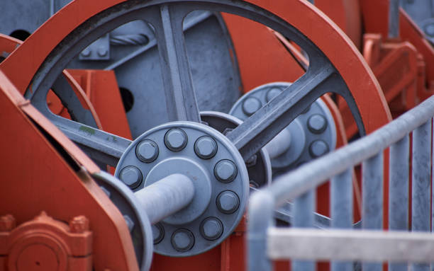 Close-up of a large orange mechanical part