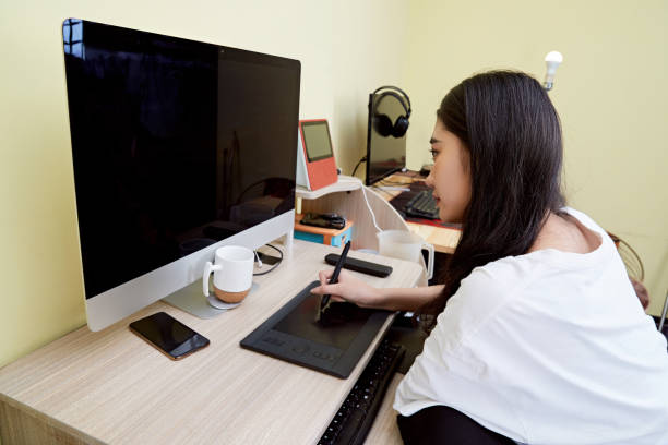 istock An Asian woman working from home on a computer 1617941746