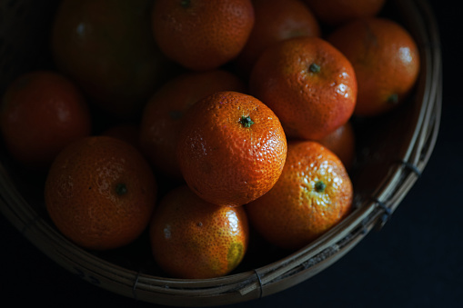 The tangerines in the basket