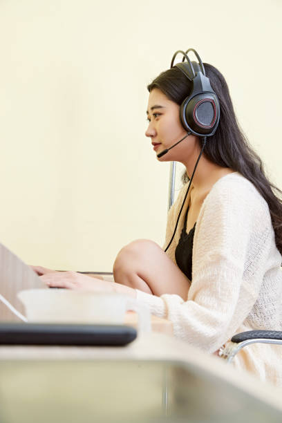 istock An Asian woman working from home on a computer 1617956240