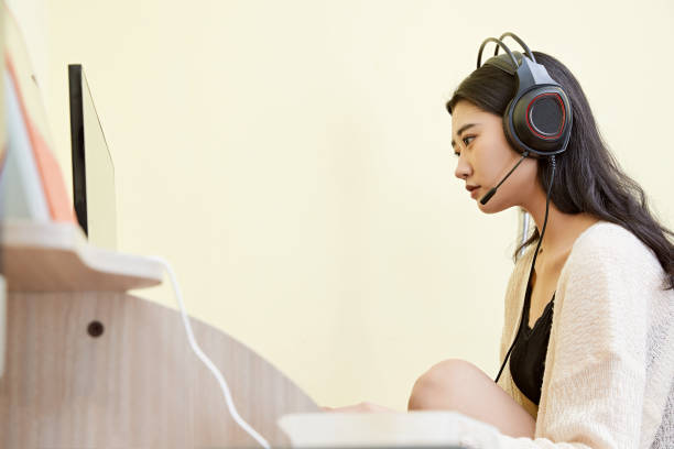 istock An Asian woman working from home on a computer 1617957836