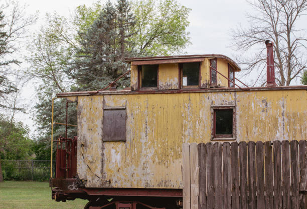 istock Weathered 19th century railway train caboose 1617967487
