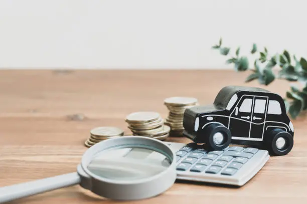 car, miniature car, calculator, magnifying glass, money, lifestyle