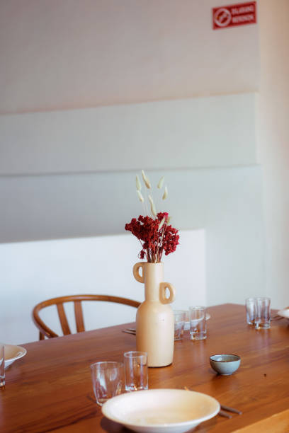 istock Empty Table Set Up with Dried Flower Decoration 1618011543