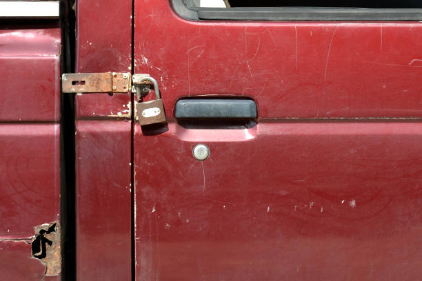 istock Car door handle metal lock, security protection padlock 1618048881