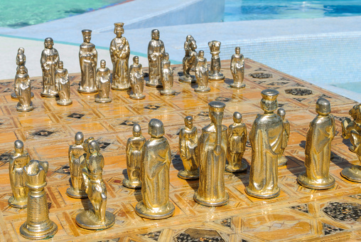 Chess pieces on a chess board.