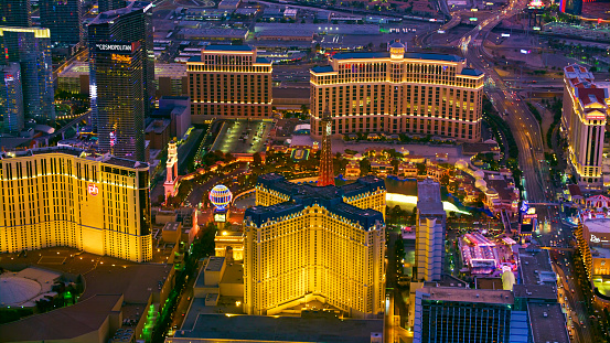 Las Vegas, Nevada/ USA - March 14, 2022: Aerial view of the hotels on the Las Vegas Strip in the evening.

Las Vegas is the largest city in the US state of Nevada and a world-renowned center for gambling, shopping, fine dining and entertainment. It is mainly famous for its many casinos and the accompanying entertainment-tourism activities, which earned it the nickname of the Entertainment Capital of the World.