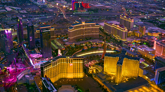 Las Vegas, Nevada/ USA - March 14, 2022: Aerial view of the hotels on the Las Vegas Strip in the evening.

Las Vegas is the largest city in the US state of Nevada and a world-renowned center for gambling, shopping, fine dining and entertainment. It is mainly famous for its many casinos and the accompanying entertainment-tourism activities, which earned it the nickname of the Entertainment Capital of the World.