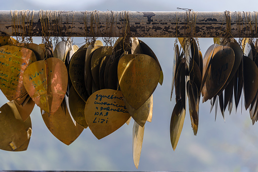 Messages of peace and love written on bronze hearts at the Big Buddha, Phuket, Thailand
