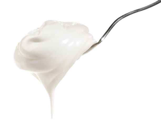 istock Beaten Egg White on a Spoon - White Background - Isolated 1618091946