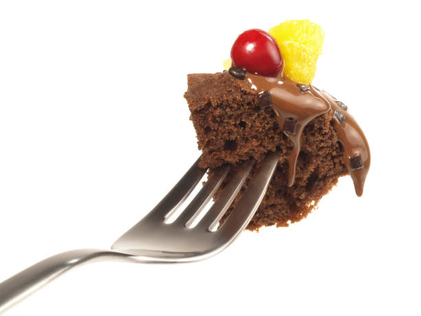 istock Chocolate Muffins with Fruits on a Fork - White Background - Isolated 1618099515