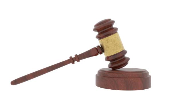 istock 3D rendering of a judge gavel isolated on a white background. 1618122998
