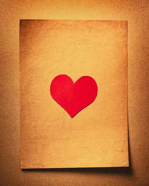 Red Heart Shape on the Old Paper closeup