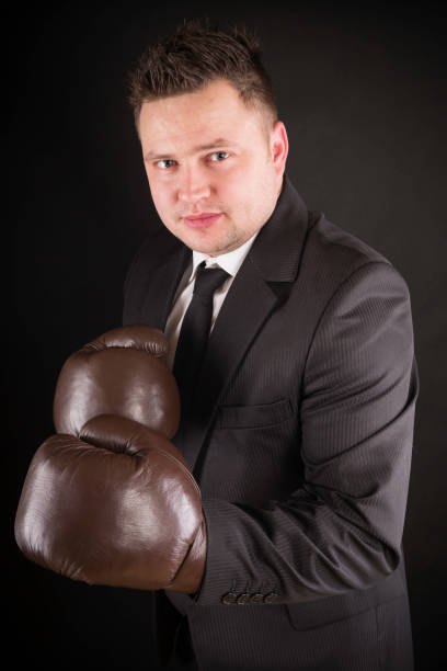 istock businessman with boxing gloves 161818568