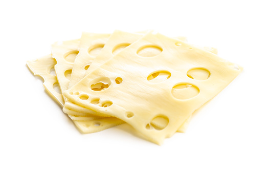 Slices of cheese isolated on the white background.
