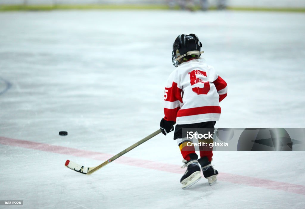 Junior de hockey sobre hielo. - Foto de stock de Niño libre de derechos