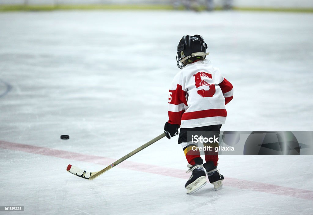 Joueur de hockey sur glace Junior. - Photo de Enfant libre de droits