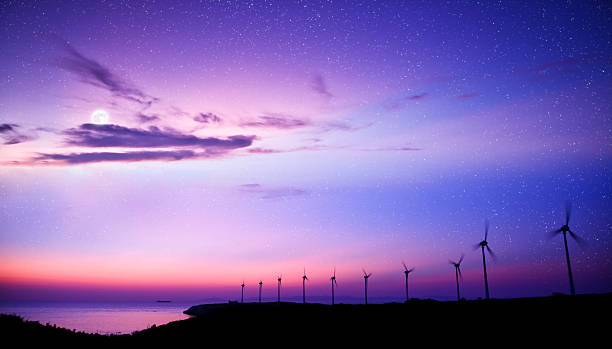 Turbina eólica pôr-do-sol - foto de acervo