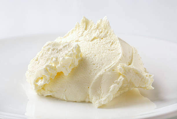vanilla cream portion of fresh vanilla cream on a white plate curd cheese stock pictures, royalty-free photos & images