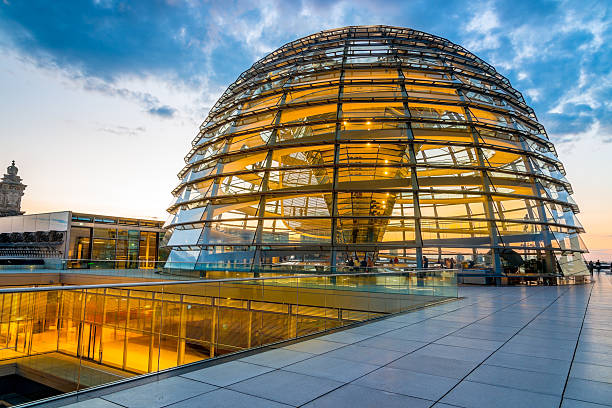 Reichstag Dome, Berlin Illuminated Reichstag Dome at Twilight.  bundestag photos stock pictures, royalty-free photos & images