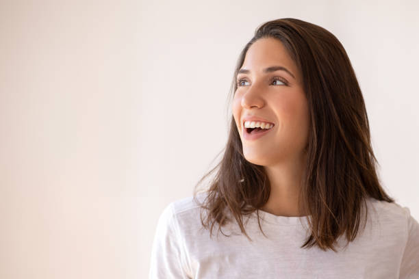 Woman smiling and looking up