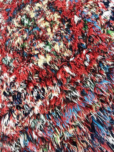 istock Colorful fluffy Textile surface, fur mat. Different fur colors. Fabric abstract background. Bright textured background. Fluffy texture of their threads of different colors. High quality photo. 1618234784
