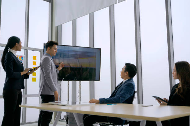 istock Employee are meeting and planning to use green technology. 1618238620