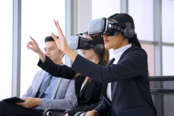 istock Employee are meeting and use virtual reality for planning. 1618240273