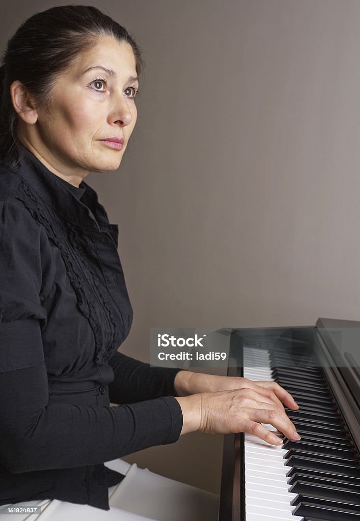 Woman playing piano Piano music playing pianist musician. 30-39 Years Stock Photo