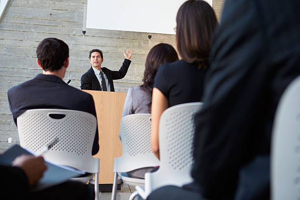 istock Young businessman delivering a presentation at a conference 161825201