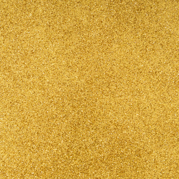 istock Trendy sparkly golden glitter texture background. Minimal background concept. Creative texture background idea. Flat lay, top of view. 1618255012