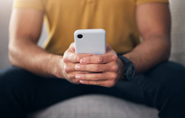 istock Closeup, hands and man with smartphone, typing and connection for communication, search website and online reading. Zoom, hand or male with cellphone, mobile app or network signal for message or text 1618257738
