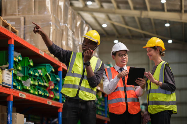 istock Industrial worker working at warehouse factory. 1618259370