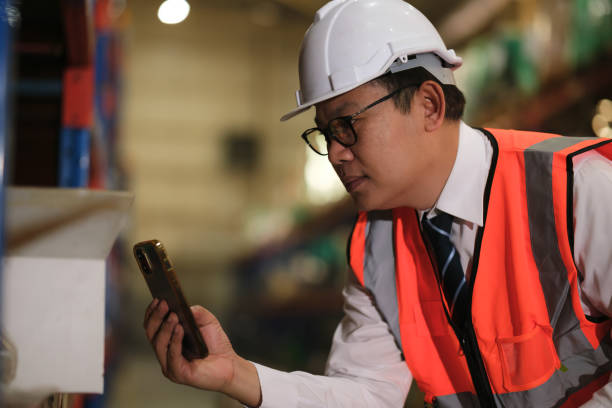 istock Industrial worker working at warehouse factory. 1618266110