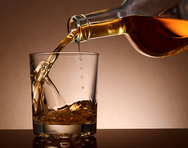 istock Pouring malt whiskey into a short glass 161826622