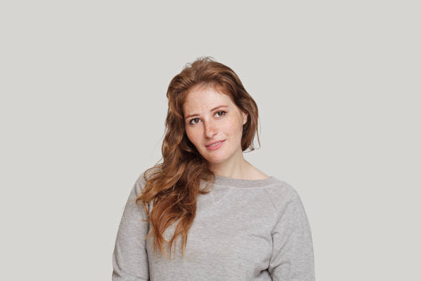 istock Pretty lady on white background, studio portrait 1618267744