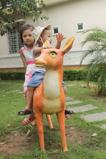 This picture is taken at Vietnam. Kids are in the park.