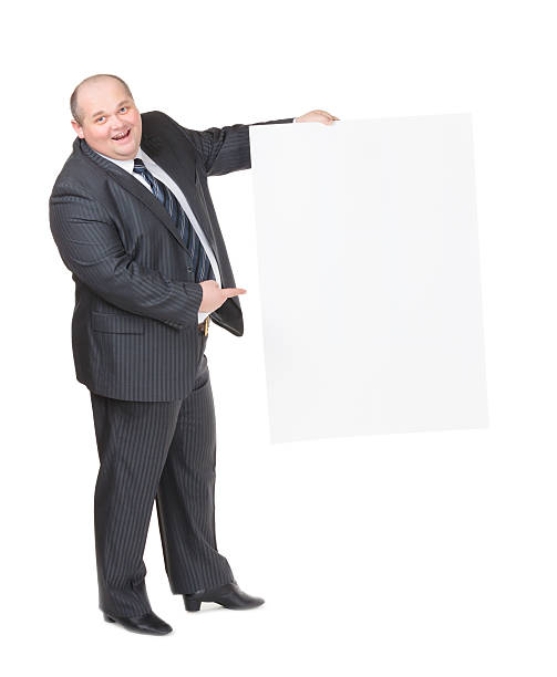 istock Cheerful overweight man with a blank sign 161827617