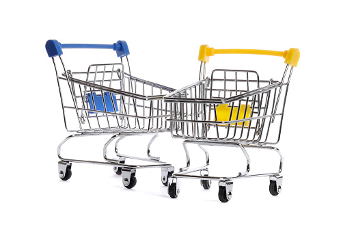 isolate two shopping carts on white background