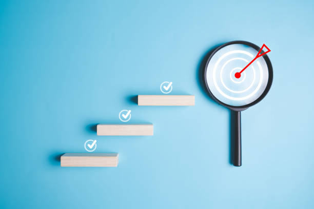 istock Target goal icon with magnifying glass for business objective target goal concept, Business strategy planning management, Business process development, Quality control assessment business goal 1618295471