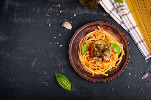 istock Pasta with minced chicken and stir-fry vegetables. Chicken spaghetti pasta 1618295513