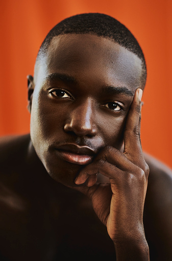 Beauty portrait of a dark skinned black man. stock photo