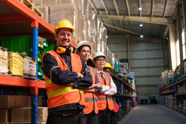 istock Industrial worker working at warehouse factory. 1618306490