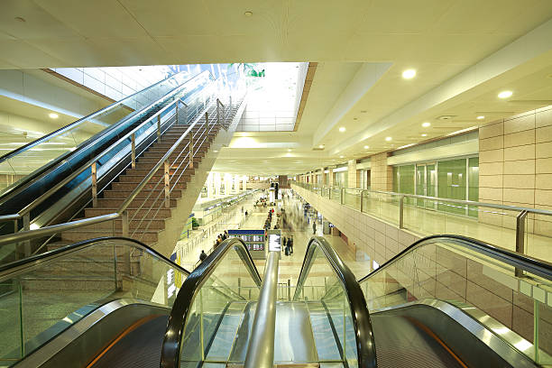 istock modern architecture steps of moving business escalator and stairs 161830771