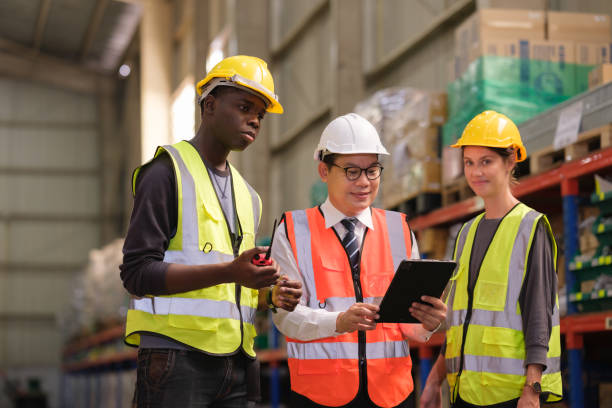 istock Industrial worker working at warehouse factory. 1618331122